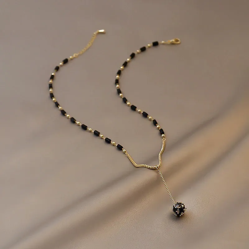 Gothic Vibe Black Beaded Chain Necklace with Long Drop Ball Charm