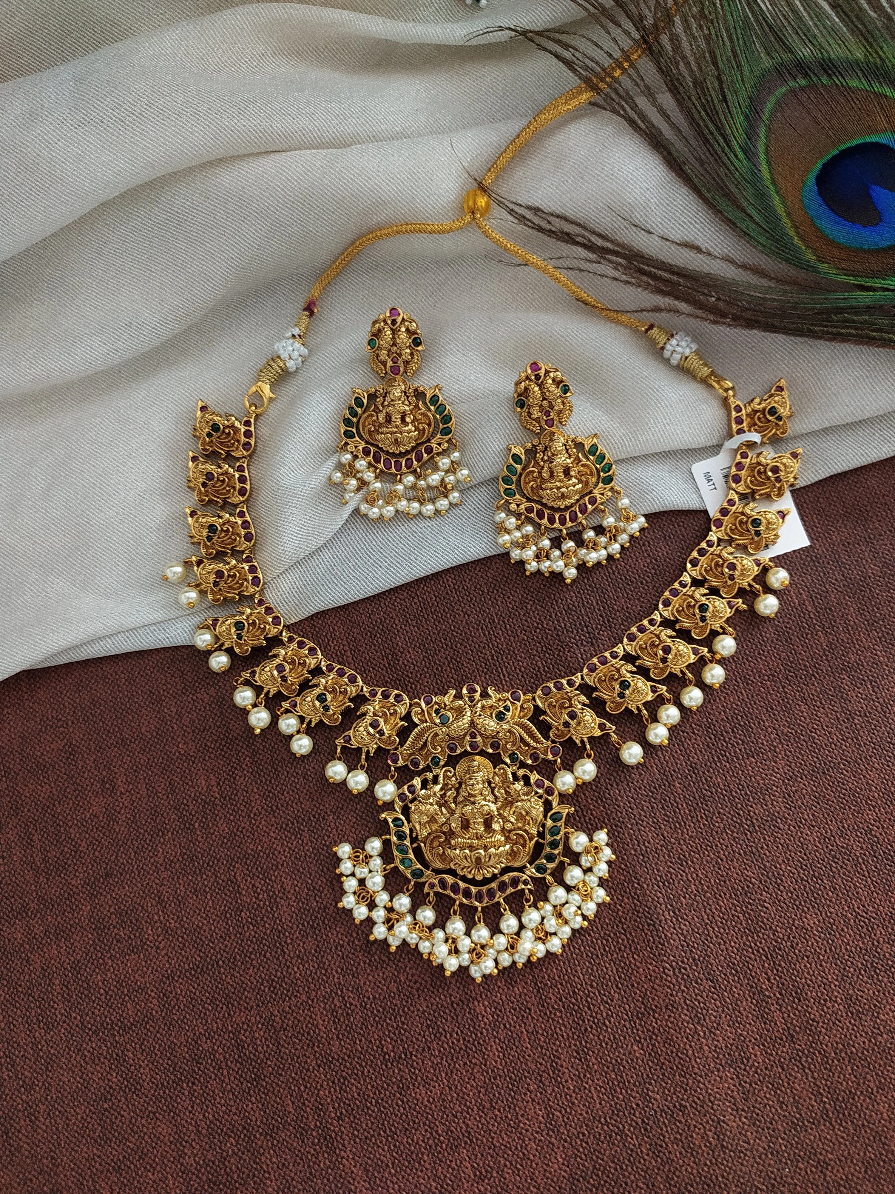 White Pearls Matt Finish Necklace Set With Peacocks and Lakshmi Design